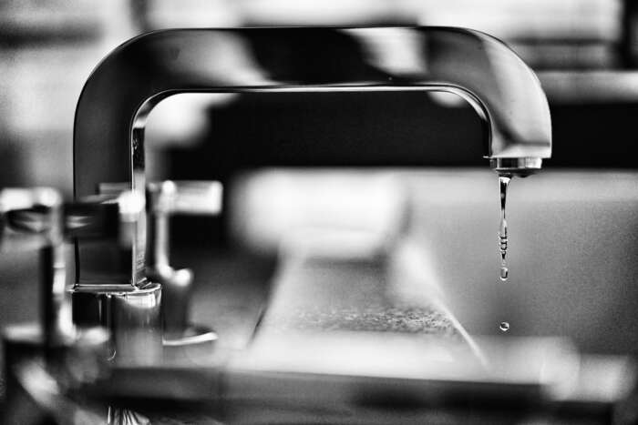 A dripping sink faucet